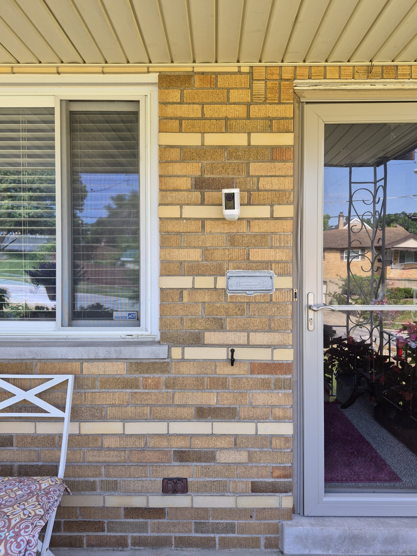 Wide view of a Ring security camera installed near a residential entrance